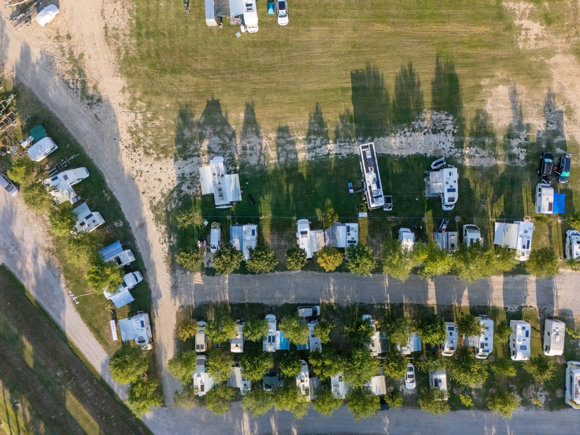 Aerial View of RVs Parked in Open Field Aerial View of RVs Parked in Open Field